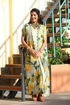 GOWN WITH EMBELLISHED CAPE
