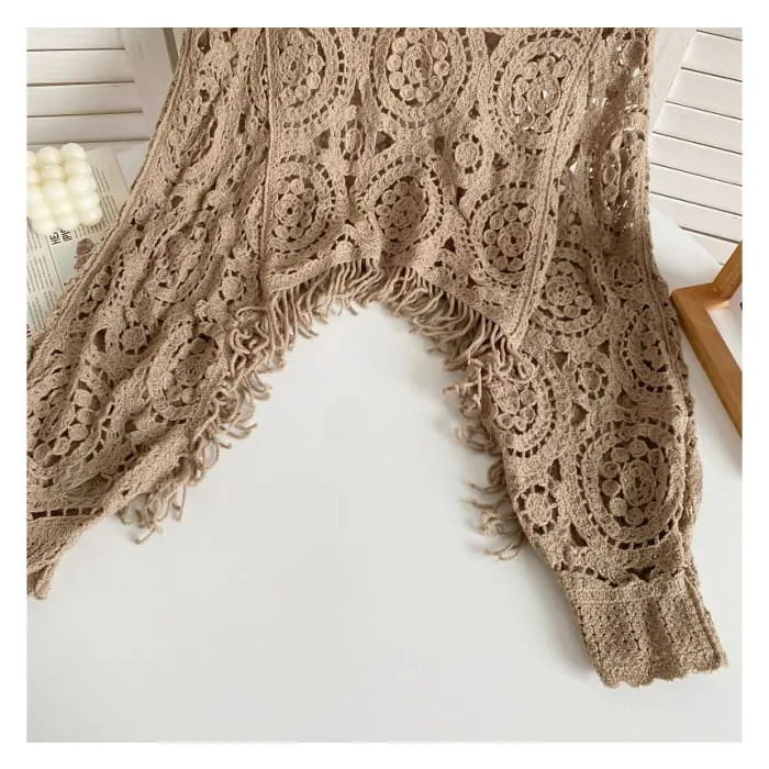 Long-sleeve Crew Neck Asymmetrical Tasseled Crop Pointelle Knit Top